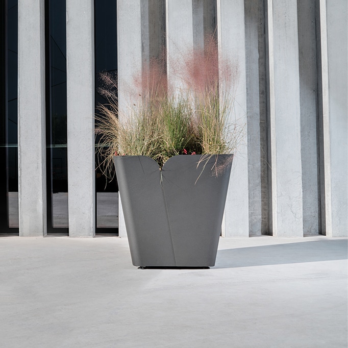 Innovative metal palm tree planter for urban tree planting by CYRIA, manufacturer of designer street furniture.